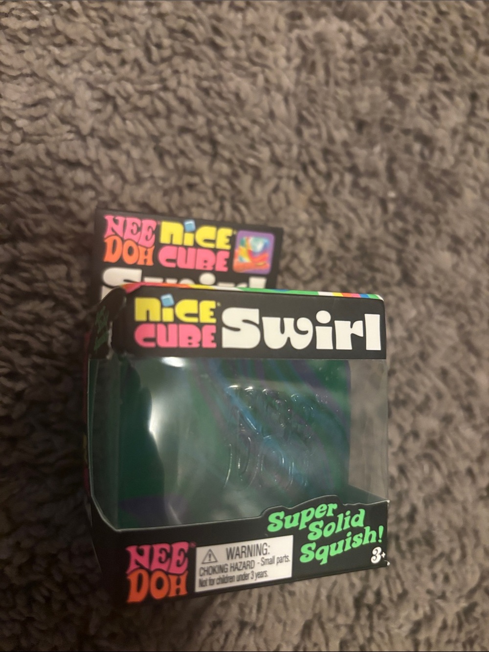 Nee Doh Nice Cube Swirl Super Solid Squish! - Green/Purple Swirl